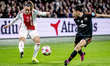 Ajax player Chasity Grant is competing against AS Roma player Lucia Di Guglielmo during th...