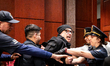 Ali, an anti-war demonstrator is arrested by Capitol Police after interrupting a House For...