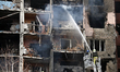 Firefighters are putting out a fire in a block of flats in the Holosiivskyi district in Ky...