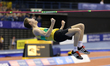 Tom Hewes is competing in the high jump during the UK Indoor Athletics Championships at th...