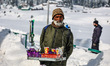 A vendor is selling chocolates in Gulmarg, Baramulla, Jammu and Kashmir, India, on Februar...