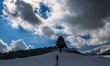 A tourist is walking on snow at the famous ski resort in Gulmarg, Jammu and Kashmir, India...