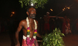 A Tamil Hindu devotee is performing an act of penance during the Nallur Sappram Thiruvizha...