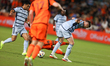 Adalberto Carrasquilla (20) is tripping over Andreu Fontàs (3) during Houston Dynamo FC's...