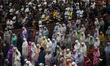 Indonesian Muslims are offering the evening mass prayer, known as Tarawih, on the second d...