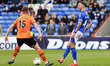 Liam Hogan of Oldham Athletic Association Football Club and Bailey Hobson of Chesterfield...