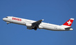 An Airbus A321-212, operated by a Swiss company, is taking off from Barcelona Airport in B...