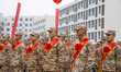 New recruits are participating in a send-off ceremony for the 2024 spring season in Lianyu...