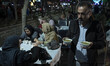 Iranian women are eating an Iftar meal in downtown Tehran during the holy month of Ramadan...