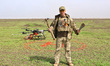 A soldier is participating in the field tests of the MinesEye unmanned system for the dete...