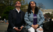 People view the solar eclipse on U.S. Capitol grounds in Washington, D.C. on April 8, 2024...