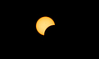 The solar eclipse is beginning to reach almost 99% totality in Royal Oak, Michigan, on Apr...