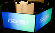 Signs are being displayed at the Petersberg Climate Dialogue 2024 in Berlin, Germany, on A...