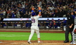 New York Mets' DJ Stewart #29 is celebrating after crossing home plate following his home...