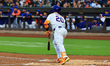 Pete Alonso #20 of the New York Mets is batting during the first inning of the baseball ga...