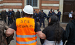 Protesters are facing off with police officers as they demand the release of five individu...