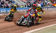 Jaimon Lidsey of Belle Vue Aces, in red, is leading Vaclav Milik of Birmingham Brummies, i...