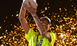 Mutaz Essa Barshim of Qatar is celebrating with his trophy on the podium during the medal...