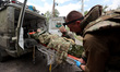 A wounded person is being evacuated from the city of Vovchansk, which is constantly subjec...