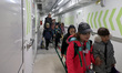 Students are walking through the corridor at an underground school in Kharkiv, northeaster...