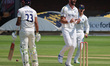 Michael Rae of Warwickshire CCC is celebrating an LBW against Essex's Feroze Khushi during...