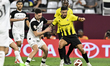 Moustafa Tarek Mashal (L) of Al Sadd SC and Bruno Ramos (R) of Qatar SC are battling for t...