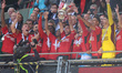 Bruno Fernandes is lifting the FA Cup Trophy after the Emirates FA Cup Final soccer match...