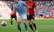 John Stones of Manchester City and Jonny Evans of Manchester United are playing during The...