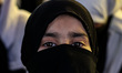 Muslim girls are taking part in a religious program on a hot summer day in DARULULOOM QADR...