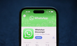 WhatsApp on App Store displayed on a phone screen is seen in this illustration photo taken...