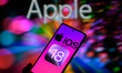 The Apple iOS 18 logo is being displayed on a smartphone in this photo illustration in Bru...