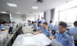 Staff members are performing an orderly scan at a scanning point for the Jiangsu Provincia...