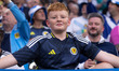 A Scotland fan is standing before the UEFA European Championship Group A match between Ger...