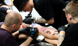A tattoo artist is working at the 17th Tattoofest Convention at EXPO Krakow in Krakow, Pol...