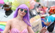 People are dressing in costumes and marching in the Mermaid Parade on Surf Avenue in Coney...
