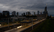Warsaw Main train station is being pictured before the city's skyline at sunset in Warsaw,...
