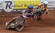 Belle Vue Aces' Ben Cook in blue is leading Leicester Lions' Ryan Douglas in white during...