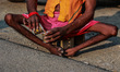 Shanti Mahraj, a specially-abled Sadhu, is drinking tea as he is moving towards the Amarna...