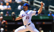 New York Mets pitcher David Peterson #23 is throwing during the second inning of the baseb...