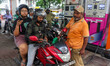 A crowd is gathering at a petrol filling station in Kolkata, India, on July 22, 2024. Peop...