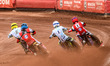 Belle Vue Aces' Norick Blodorn in Blue is chasing Oxford Spires' Rohan Tungate in White, O...