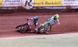 Belle Vue Aces' Ben Cook in Blue is losing control after a tangle with Oxford Spires' Char...