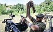 A fighter of the Separate Anti-Aircraft Machine Gun Battalion, who is providing air cover...