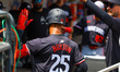 Minnesota Twins' Byron Buxton #25 is being congratulated after homering during the second...