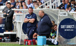 Hartlepool manager Darren Sarll is looking on with arms folded during the pre-season frien...