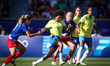 Albert Korbin of the United States team is battling for possession with Vitoria Yaya of th...