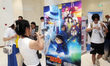 Animation fans and Internet celebrity bloggers are posing for a Cosplay selfie with a post...