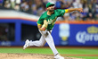 Oakland A's pitcher Scott Alexander #54 is throwing during the sixth inning of the basebal...
