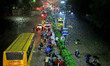 Vehicles are moving through the waterlogged road at Narayan Singh Circle following heavy m...