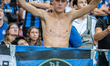 An Atalanta BC supporter is standing on the tribune before the Supercup final between Real...